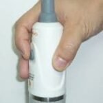 cropped portable bladder scanner probe holding.jpg